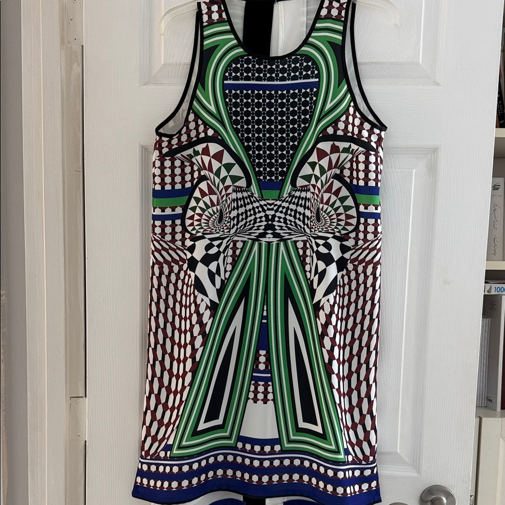 Clover Canyon peplum top featuring a bold, digitally printed pattern Size M